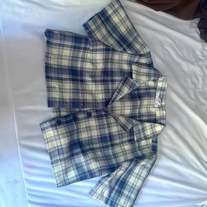 small muted navy and cream white cropped jacket